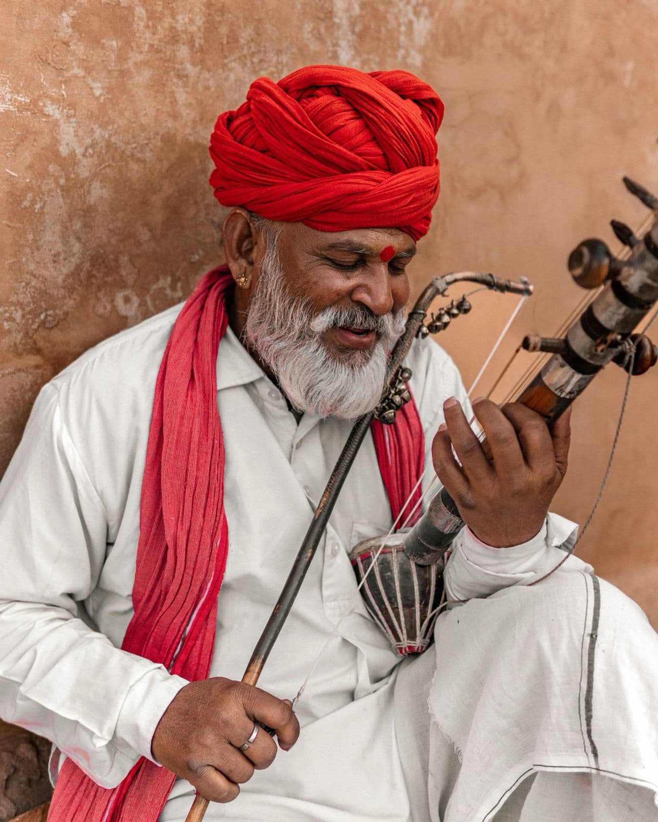 A Rajasthani musician with a traditional instrument