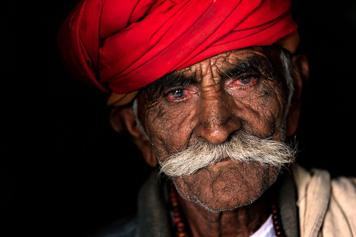 Elderly Rajasthani man in a red turban
